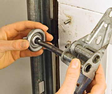 how to replace garage door rollers